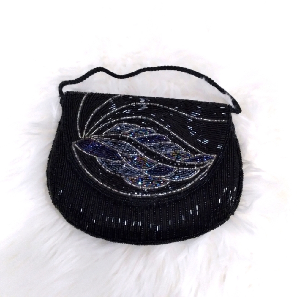 Small vintage beaded purse with long strap. (Just tucked inside the bag for now)